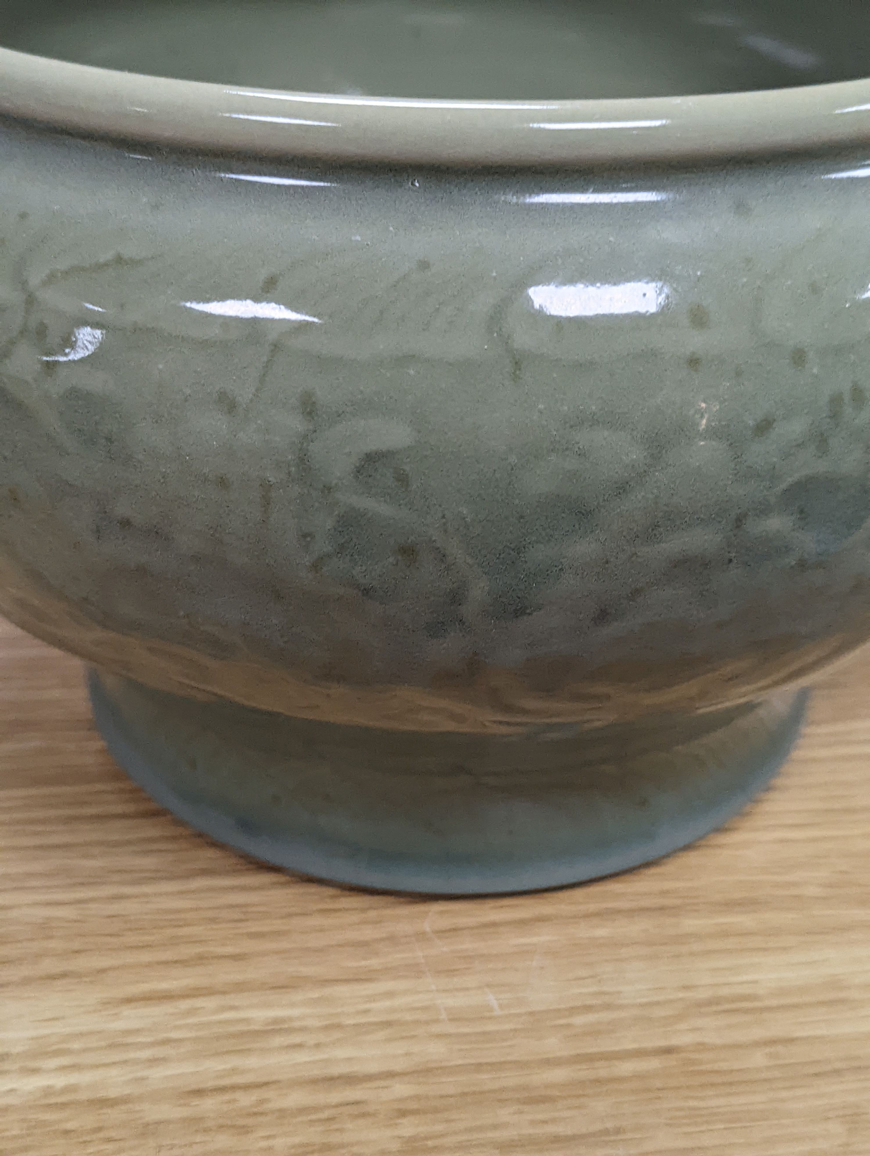 A Chinese celadon glazed bowl - 17.5cm tall